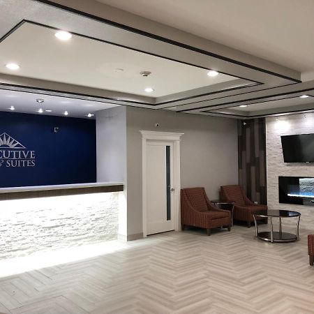 Executive Inn And Suites Joaquin Bagian luar foto