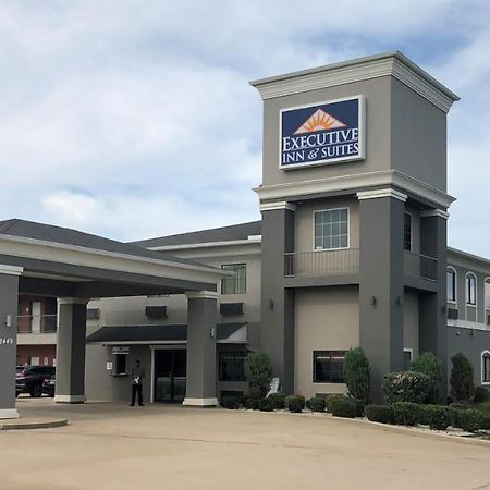 Executive Inn And Suites Joaquin Bagian luar foto