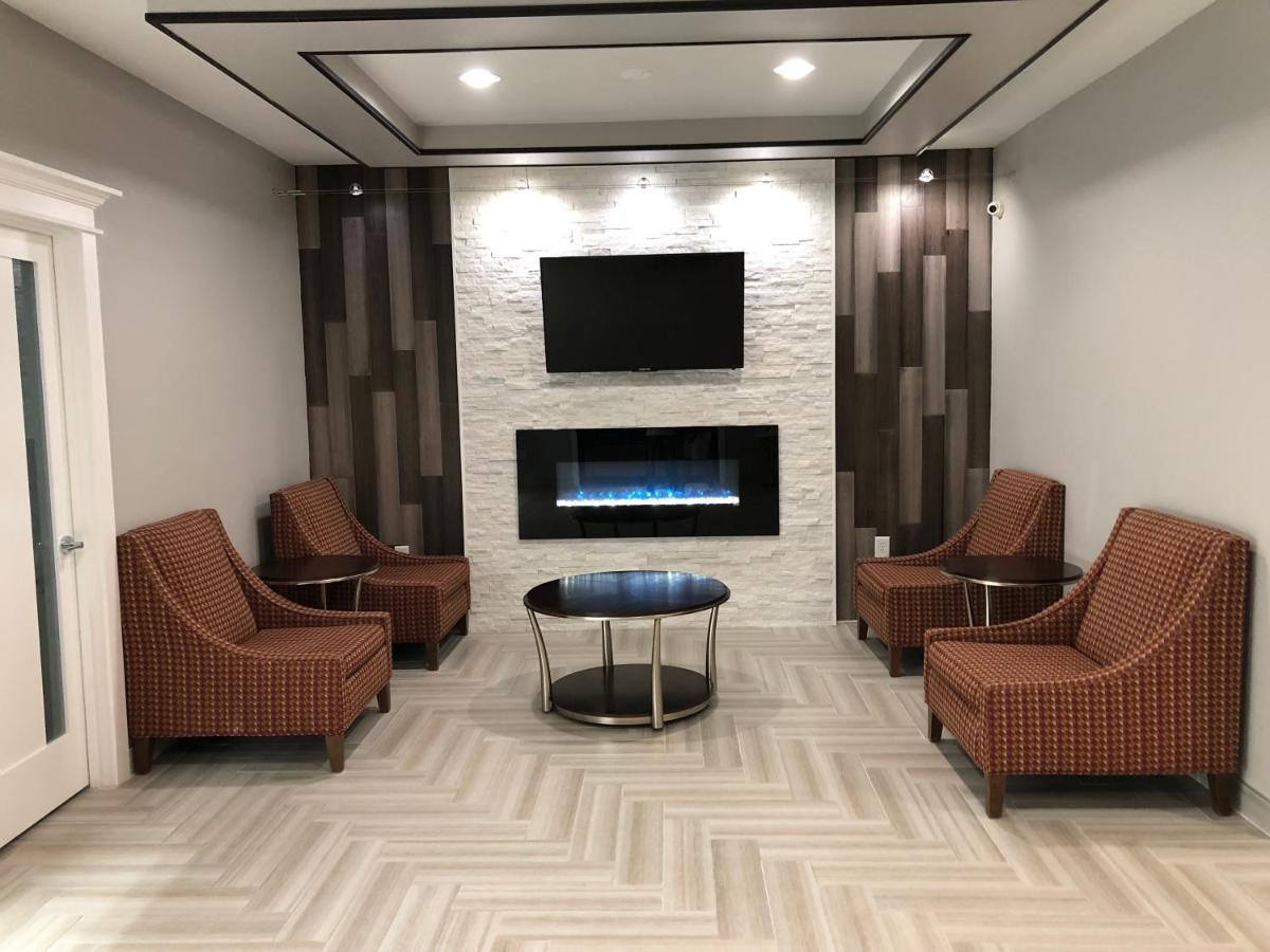Executive Inn And Suites Joaquin Bagian luar foto