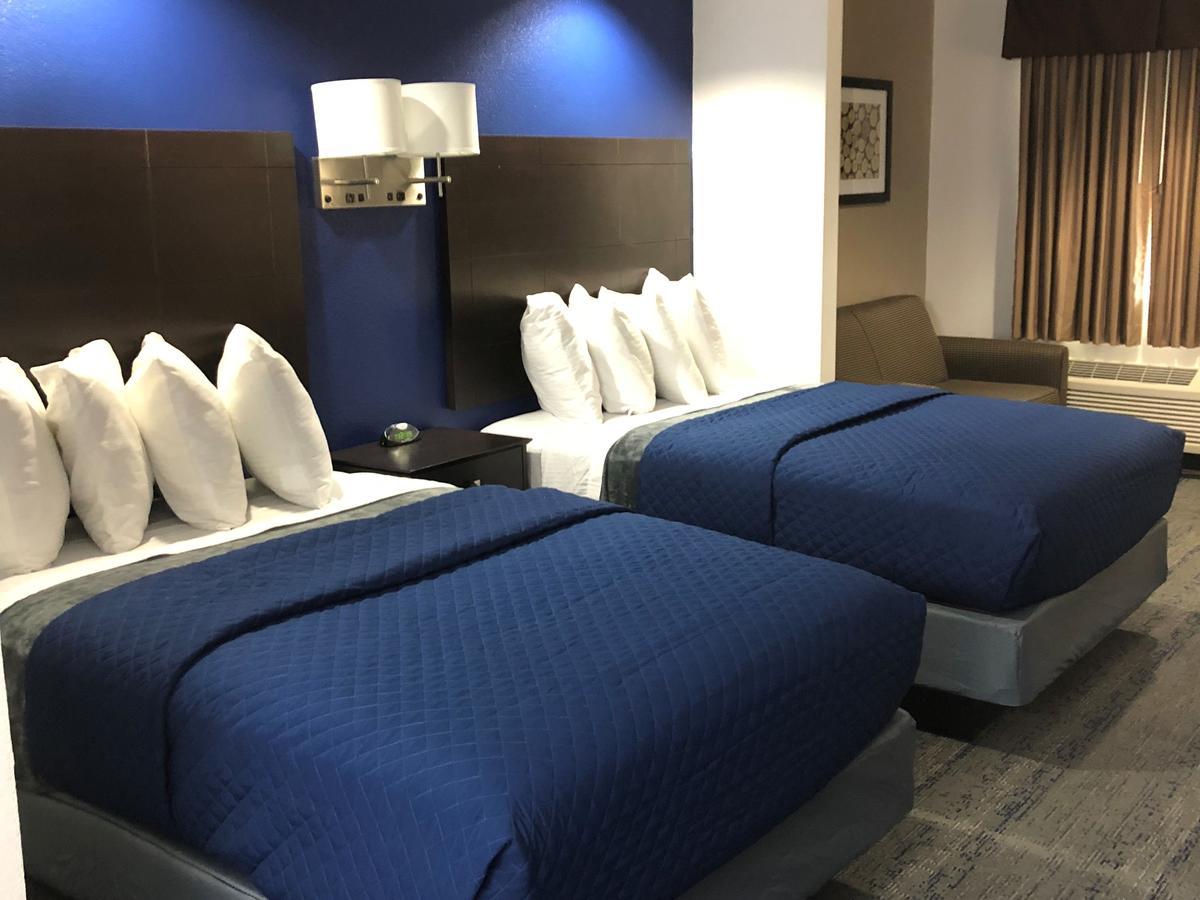Executive Inn And Suites Joaquin Bagian luar foto