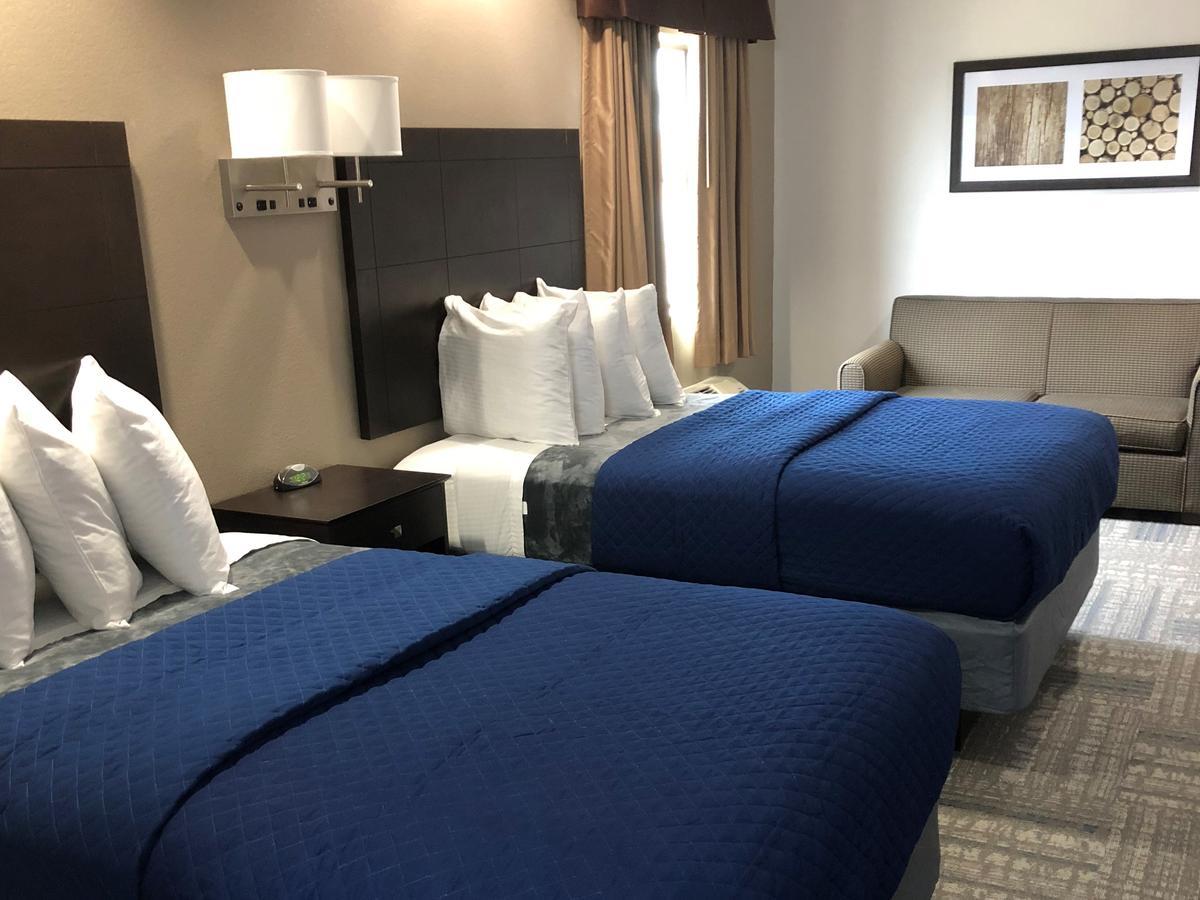 Executive Inn And Suites Joaquin Bagian luar foto